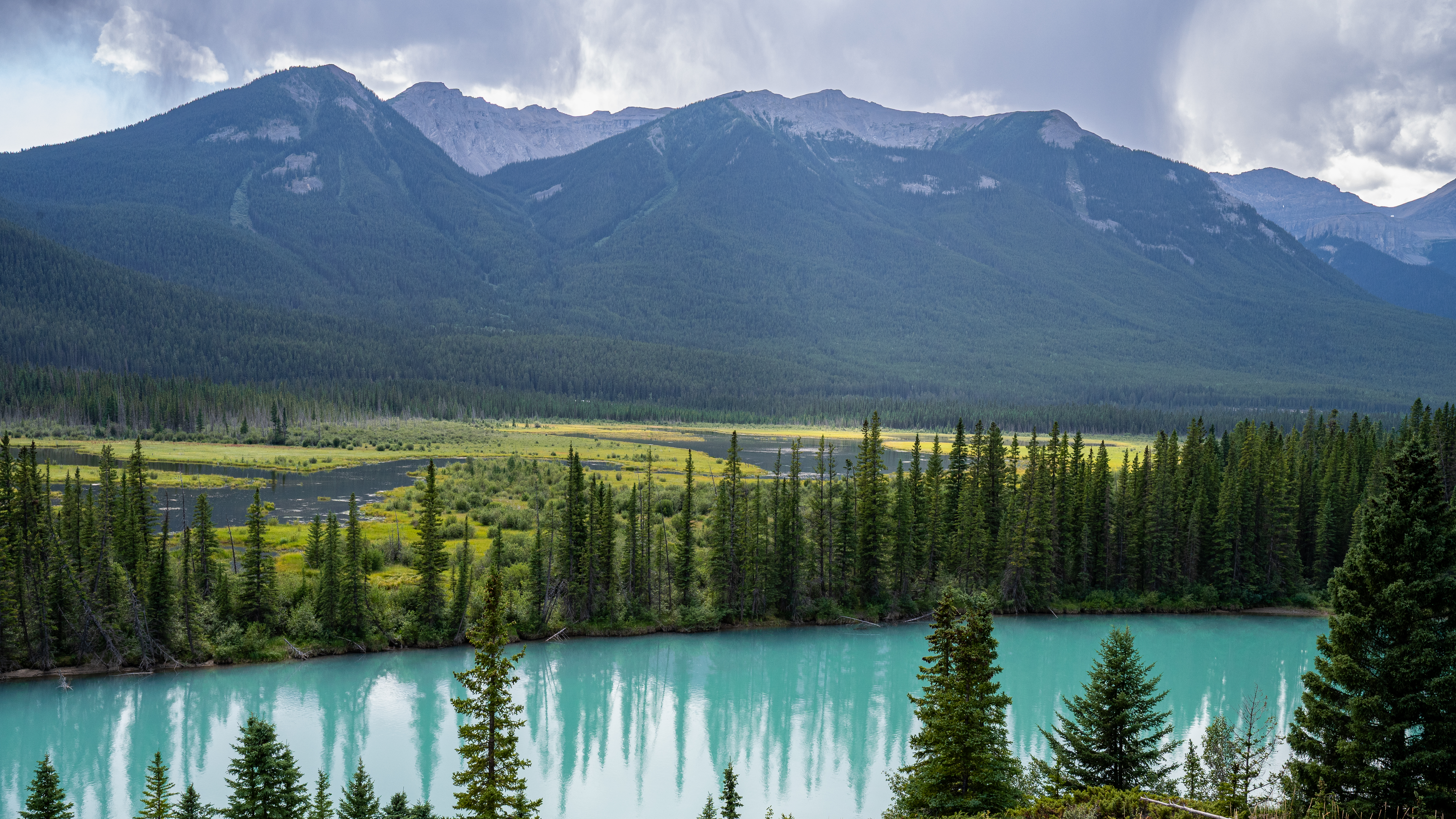 Turquoise meltwater along the Bow River corridor, early afternoon