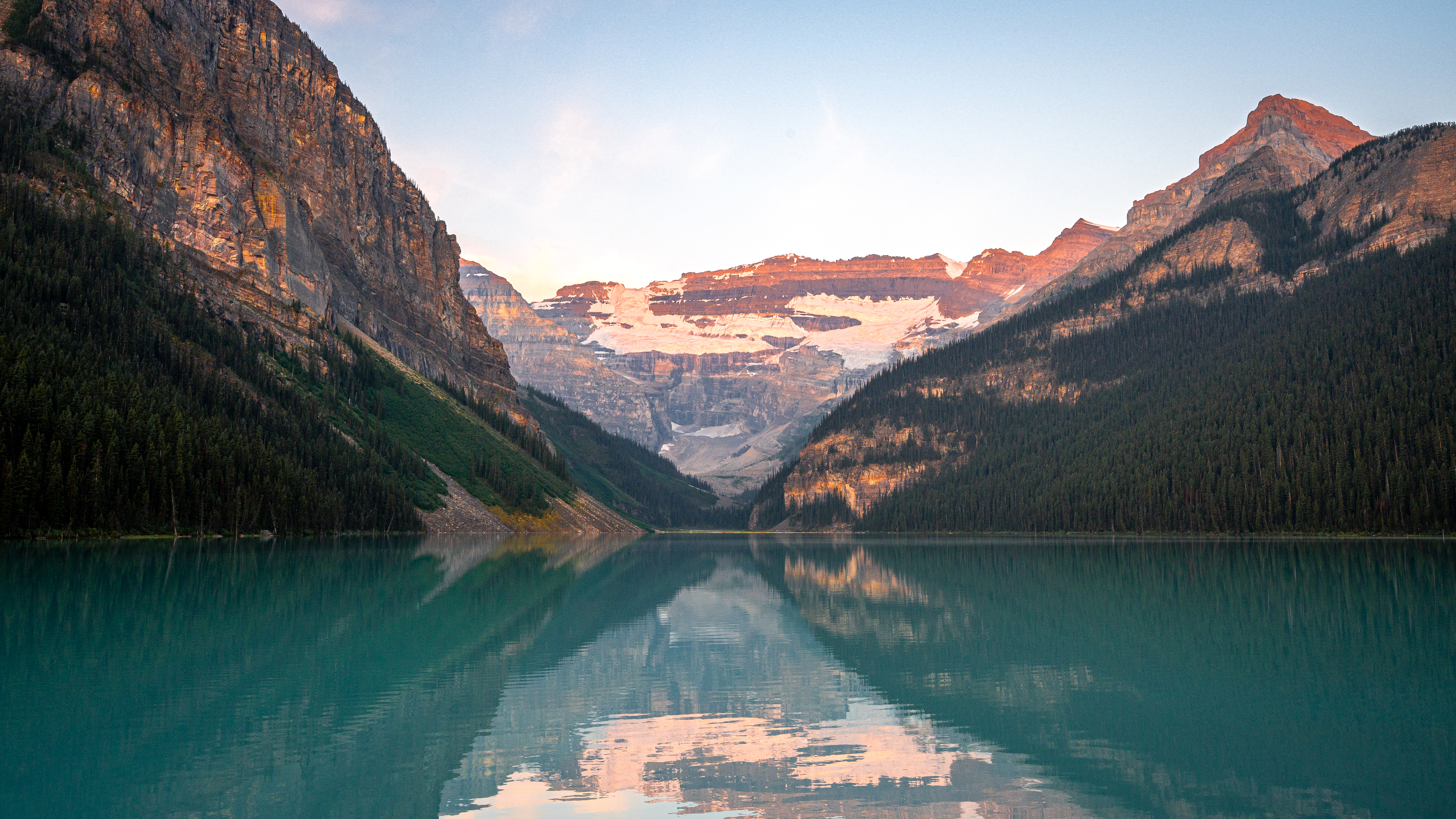 Lake Louise at alpenglow — the Victoria Glacier at the far end of the valley